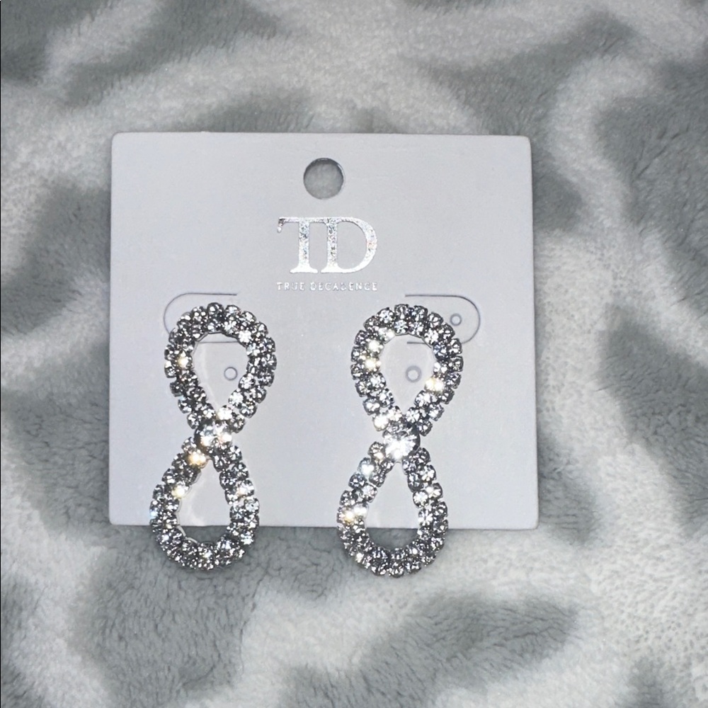 True Decadence Silver Infinity Earrings